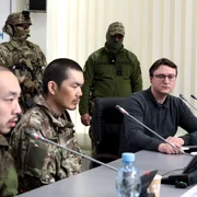Conferință de presă prizonieri chinezi FOTO Profimedia jpg