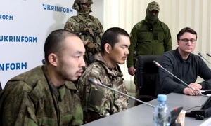 Conferință de presă prizonieri chinezi FOTO Profimedia jpg