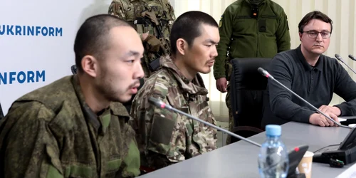 Conferință de presă prizonieri chinezi FOTO Profimedia jpg