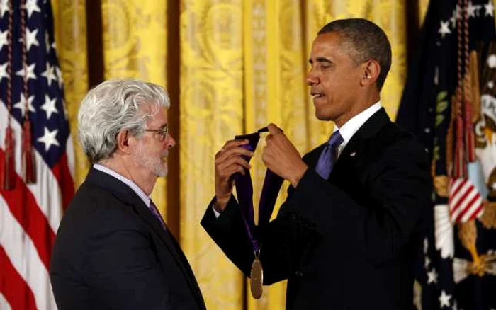 Preşedintele Barack Obama i-a recunoscut meritele lui George Lucas. FOTO Reuters