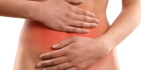 durere de burta chisturi stomac femeie Shutterstock