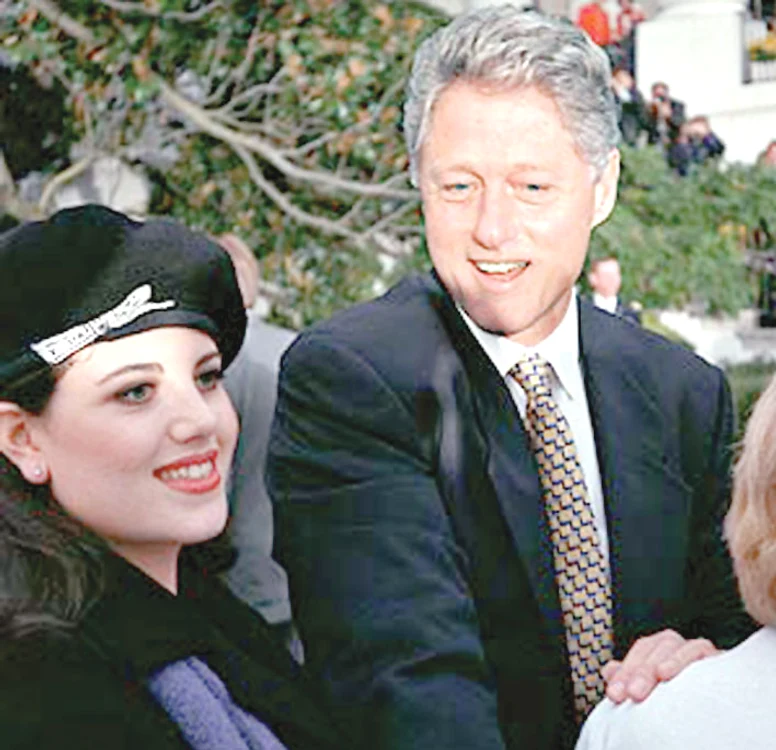 Clinton şi Monica, într-o vizită oficială