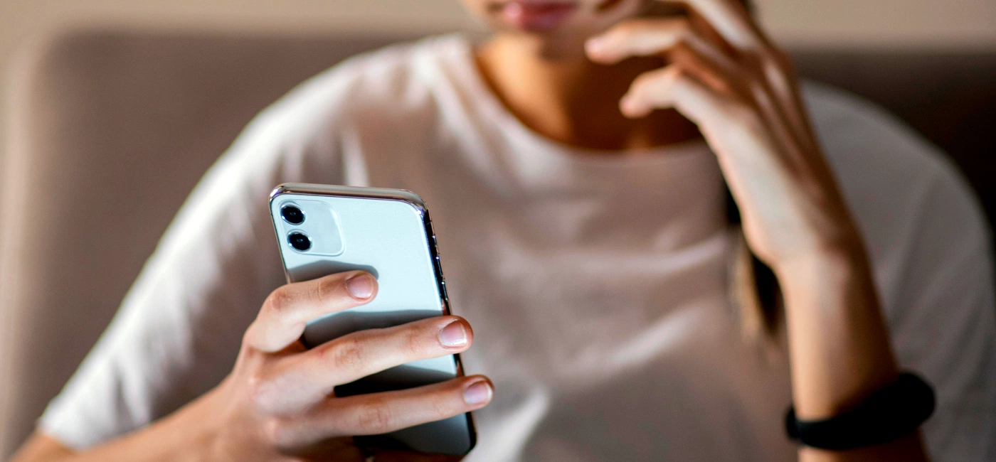 young girl using mobile jpg
