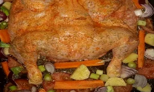 pui la cuptor pe pat de legume jpeg