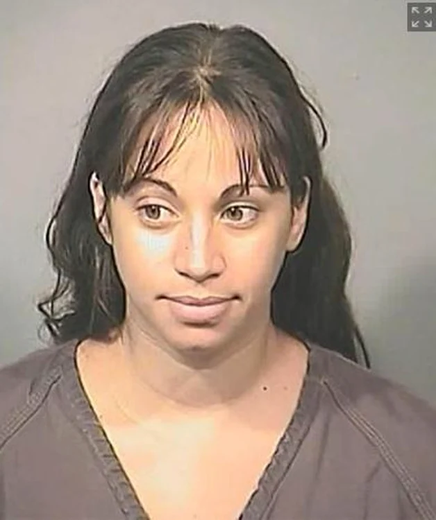 
    Femeia a mai fost acuzată și pentru expunere indecentă în fața claseiFoto: Brevard County Sheriff's Office  