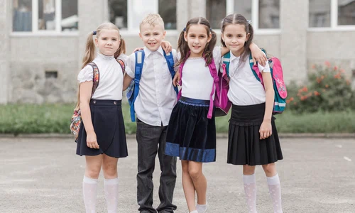 boy hugging girls near school jpg