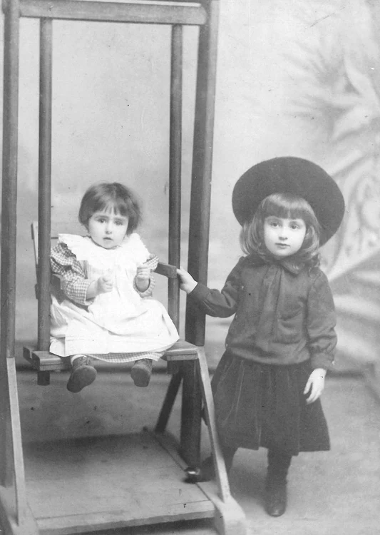 Radu Florescu,  dressed like a girl,  and his small sister Elza 