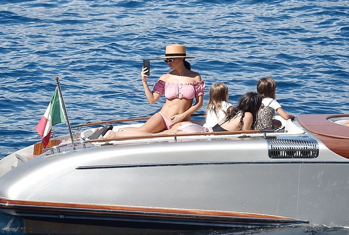 *EXCLUSIVE* Kourtney Kardashian has fun with her children aboard a boat in Portofino jpeg