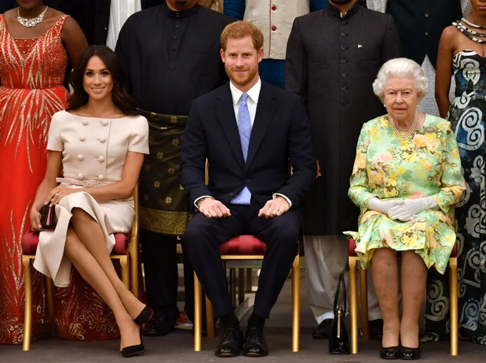 
    Meghan Markle, Prinţul Harry şi Regina Elisabeta  