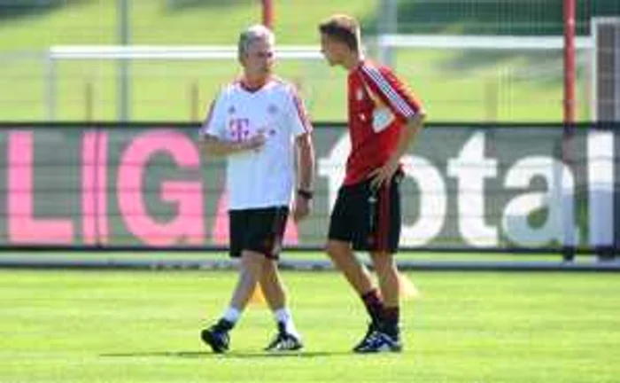 Antrenorul Jupp Heynckes si noul venit Nils Petersen, la primul antrenament al lui Bayern