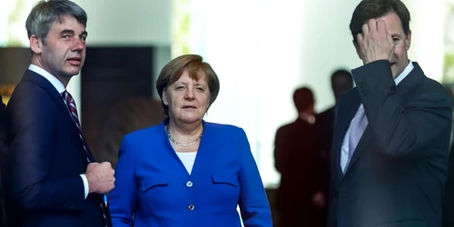 Jan Hecker alaturi de Angela Merkel FOTO EPA-EFE