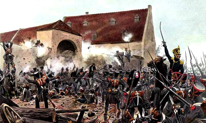 Asaltul fermei La Haye Sainte - un punct strategic în timpul Bătăliei de la Waterloo, apărat de 400 de soldați prusaci. Pictură de Richard Knötel (© Wikimedia Commons)
