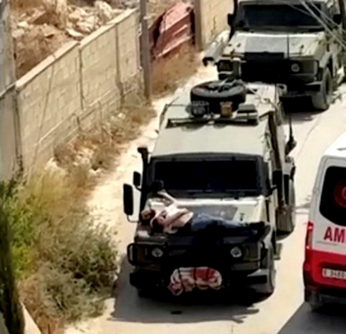 FOTO: Palestinian, legat pe capota unui jeep al armatei FOTO: X