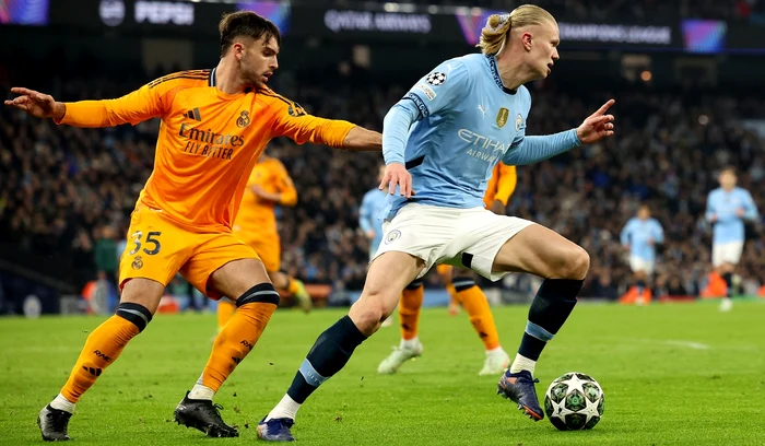 Erling Haaland (dreapta) a înscris o „dublă” în Liga Campionilor (FOTO: EPA)