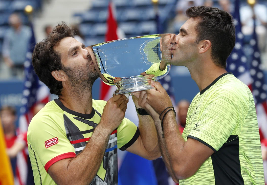 
    Horia Tecău şi olandezul Jean-Julien Rojer au câștigat US Open în 2017Foto: EPA-EFE  