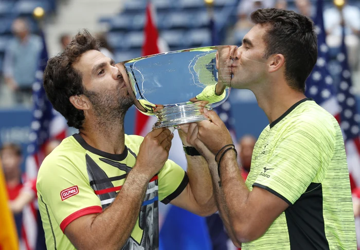 
    Horia Tecău şi olandezul Jean-Julien Rojer au câștigat US Open în 2017Foto: EPA-EFE  