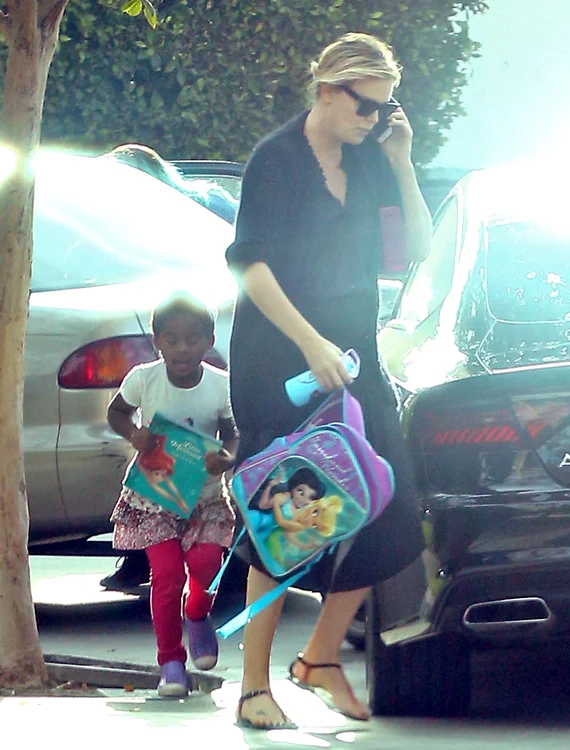 Exclusive Charlize Theron Runs Errands With Her Daughter In LA jpeg