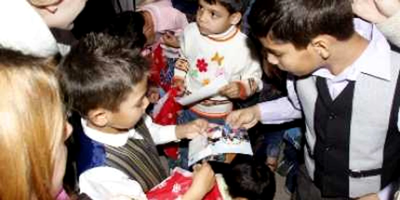 România ar putea relua adopţiile internaţionale