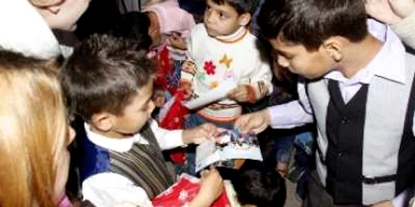 România ar putea relua adopţiile internaţionale