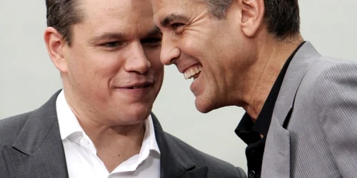Matt Damon şi George Clooney AFP