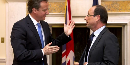 Premierul britanic David Cameron şi preşedintele francez Francois Hollande