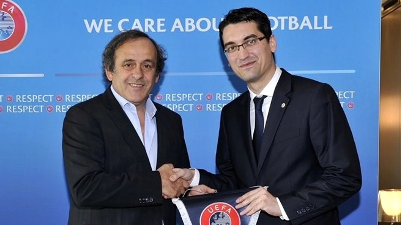
    Răzvan Burleanu şi Michel Platini  