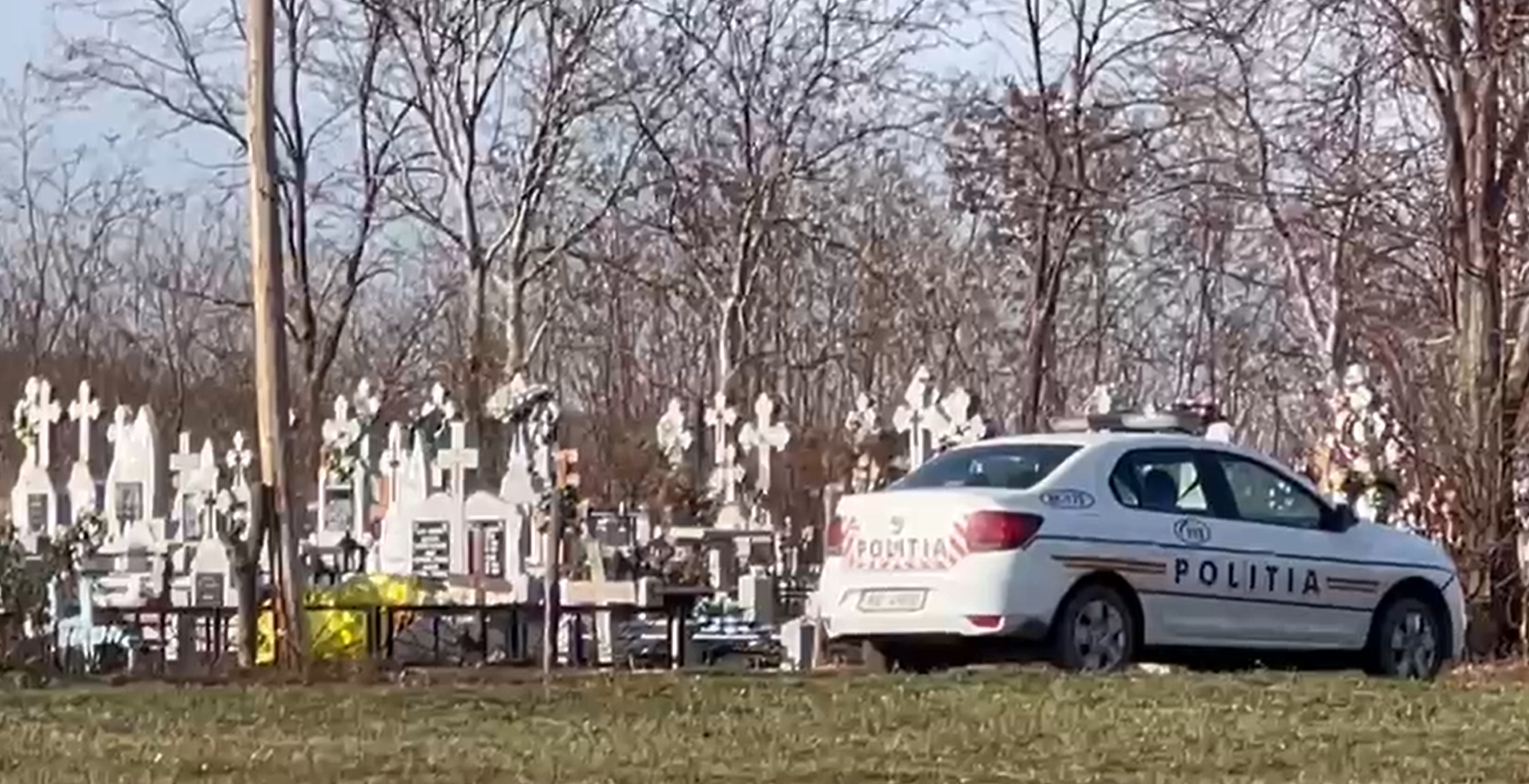 politist mort cimitir jpg