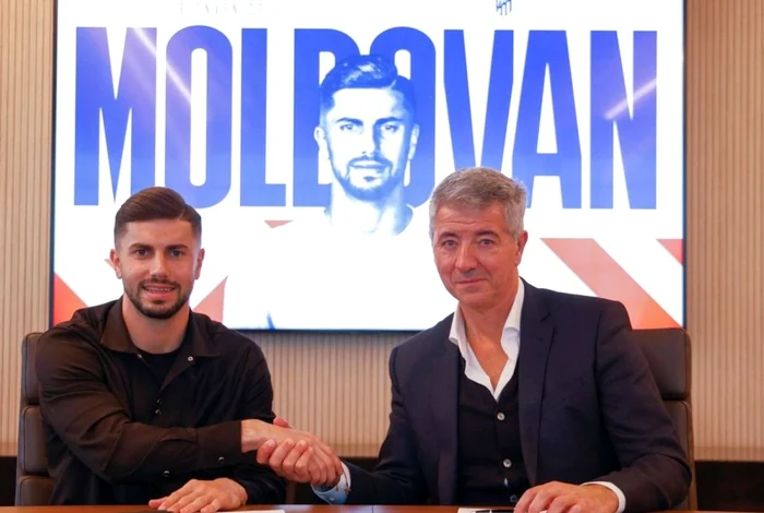 Horațiu Moldovan a bătut palma cu oficialii clubului spaniol. Foto Atletico Madrid