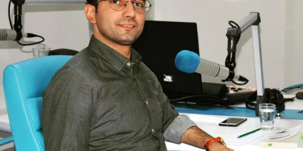 reporterul Musab Turan