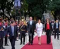 Carmen Iohannis în costum alb în vizita din Argentina