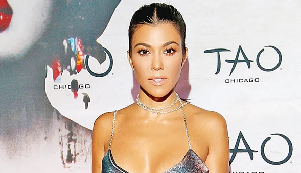 Kourtney Kardashian  a fost acuzată de fani  că îşi ascunde sarcina (sursa foto Gettyimages)