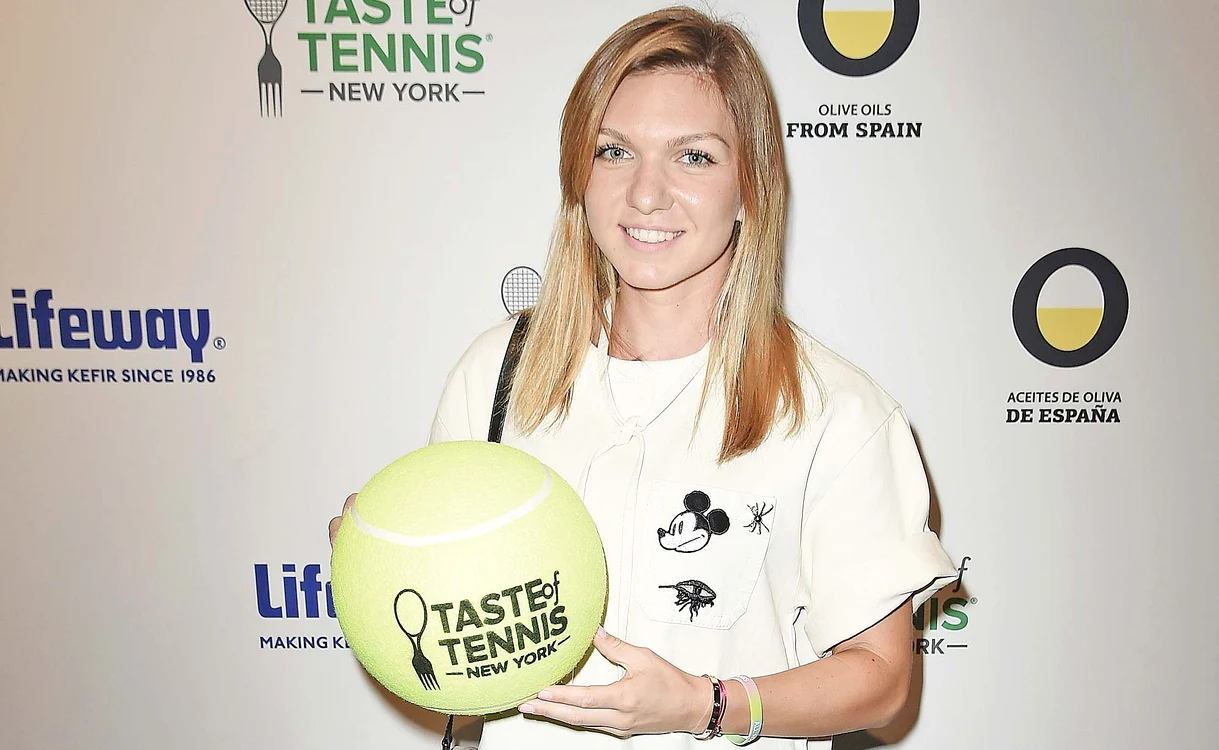
    Simona Halep a fost asaltată de fotografi pe covorul verdeFoto: Guliver, Getty Images  