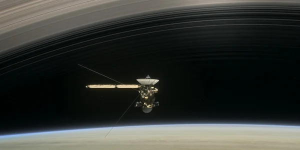 sonda spatiala cassini intre inelele lui saturn ilustratie foto NASA