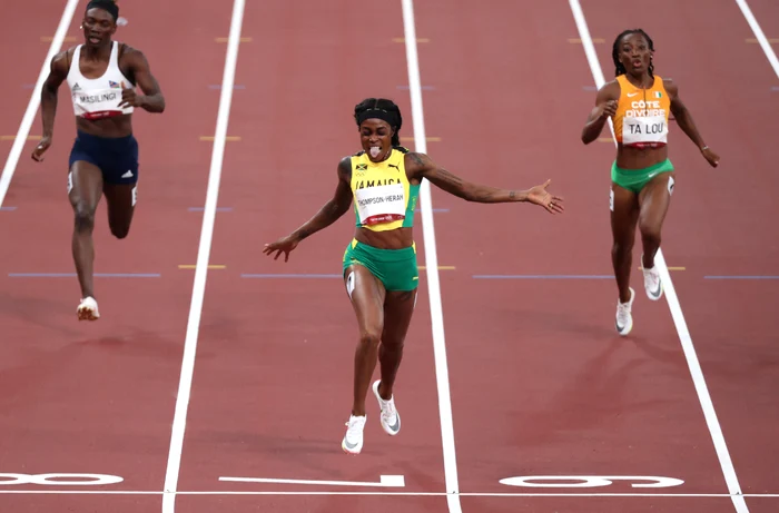 
    Elaine Thompson a terminat finala cu zâmbetul pe buzeFoto: Guliver / GettyImages  