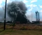 Fumul toxic şi incendiul de la uriaşul depozit de deşeuri continuă să le facă probleme localnicilor de la Salonta. FOTO