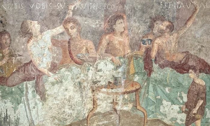 Oaspeți la un banchet. Frescă romană descoperită la Pompeii (Flickr / Tyler Bell) 