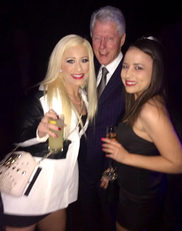 Bill Clinton, alături de două prostituate
