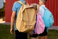 kids getting back school together jpg