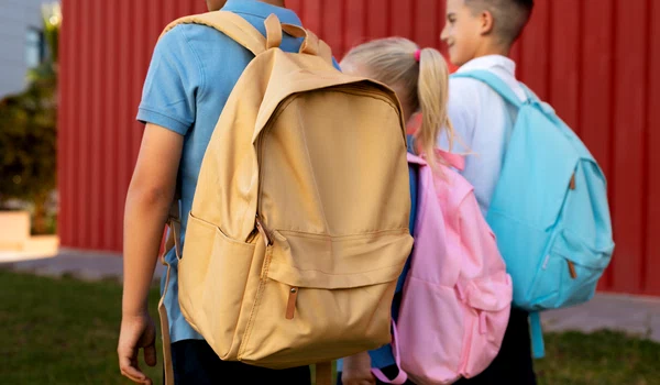 kids getting back school together jpg
