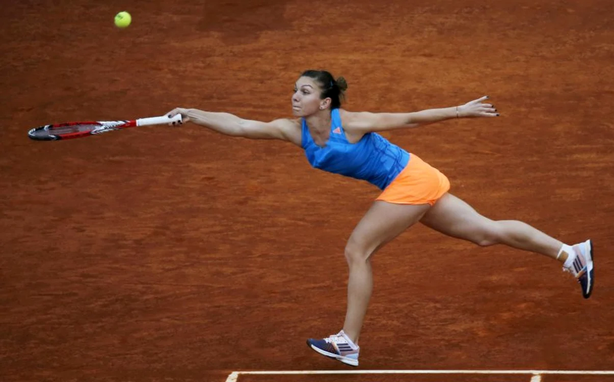 
    Simona Halep s-a întins serios pentru victoria de la Madrid cu Sabine Lisicki. (Foto: Reuters)  