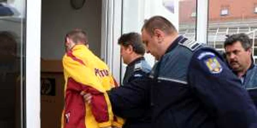 Tânărul au fost reţinut de poliţişti. Foto arhivă