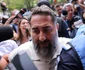 Ionel Rusen este escortat de polițiști la sediul DIICOT din București, 21 septembrie 2026. Inquam Photos / George Călin