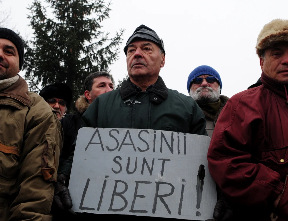 Moartea sutelor de oameni după 22 decembrie 1989 nu a fost uitată. FOTO: AFP