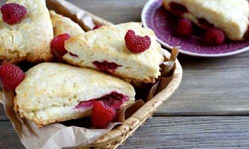 32014808   scone with raspberry in a wicker basket, delicious food jpeg
