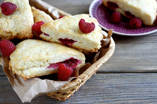 32014808 scone with raspberry in a wicker basket, delicious food jpeg
