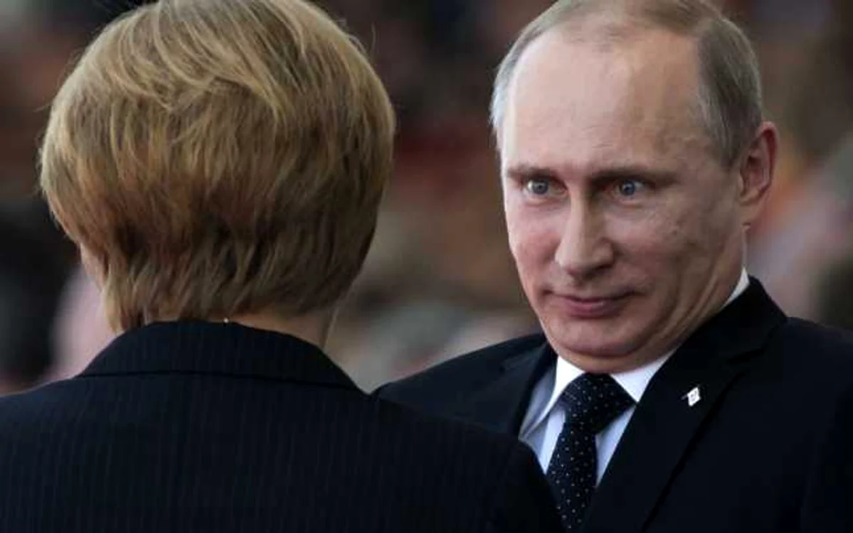 Angela Merkel şi Vladimir Putin, la Minsk FOTO AP