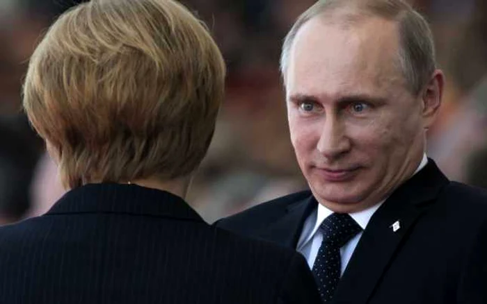 Angela Merkel şi Vladimir Putin, la Minsk  FOTO AP