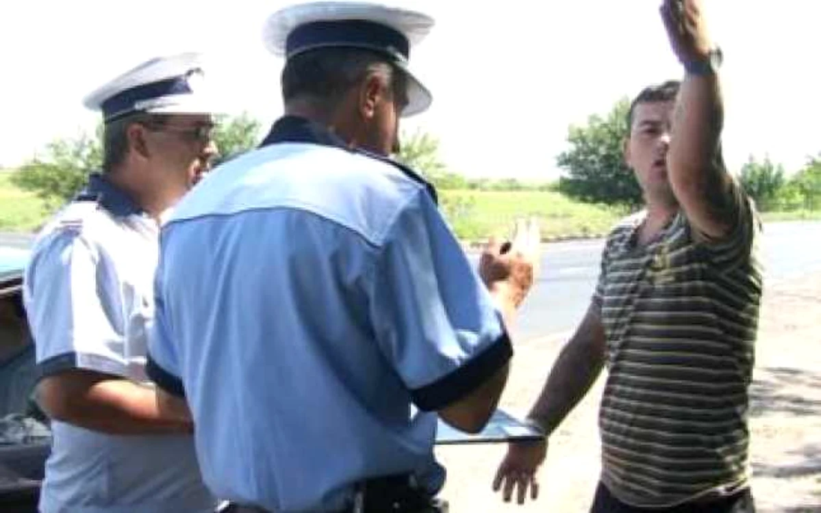 Craiova: Exculsiv / VIDEO: Un bărbat din Băileşti a vrut să bată un poliţist (galerie foto)