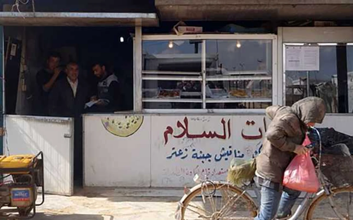 „Pizzeria Păcii“ face pizza pentru refugiaţii sirieni din tabăra Zaatari, Iordania FOTO Nasserddine Touaibia/UNHCR
