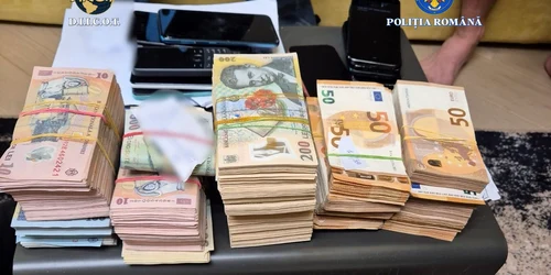 Percheziții într-un dosar privind funcționarea unui site pe care putea fi comandat un asasin plătit în criptomonede